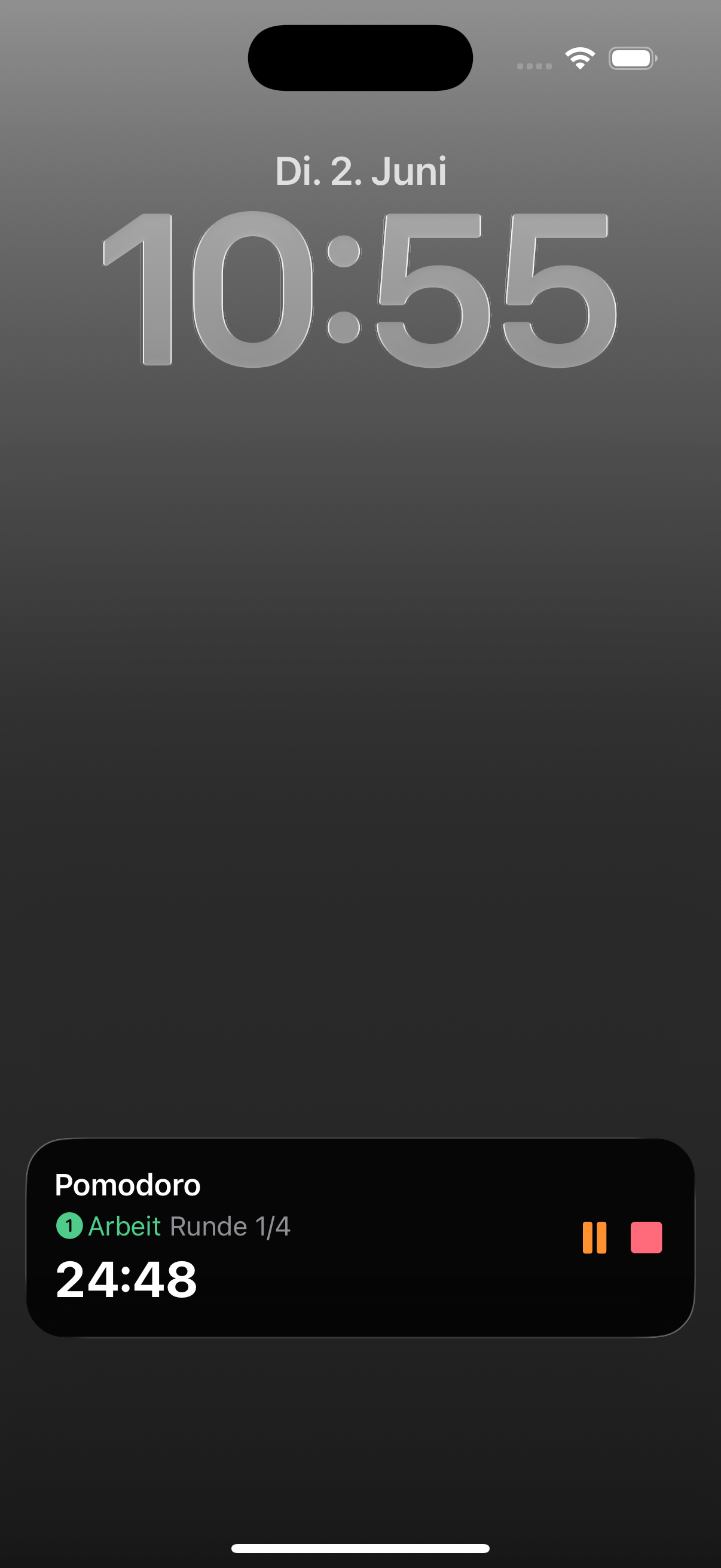 Ein iPhone-Sperrbildschirm mit einem Pomodoro-Timer als Live-Aktivit&auml;t: der Name Pomodoro, die Phase Arbeit, Runde 1/4, ein Countdown sowie Pause- und Stopp-Taste